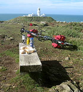 Cycling picnic lunch at Strumble Head lighthouse, Pembrokeshire